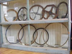 Display of wooden steering wheels & bicycle rims